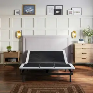Adjustable BTX4 bed base in a modern bedroom setting, featuring a sleek design and positioned against a stylish headboard, highlighting its functionality and aesthetic appeal for bedding solutions.