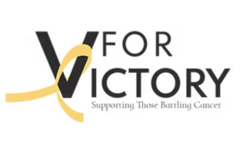 Logo of "V for Victory," featuring a stylized letter V and a ribbon, symbolizing support for community initiatives and well-being.