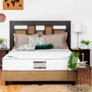 King Koil Alder Plush Tight Top mattress displayed on a stylish bed frame with decorative pillows and a modern bedroom setting, emphasizing comfort and quality for restful sleep.